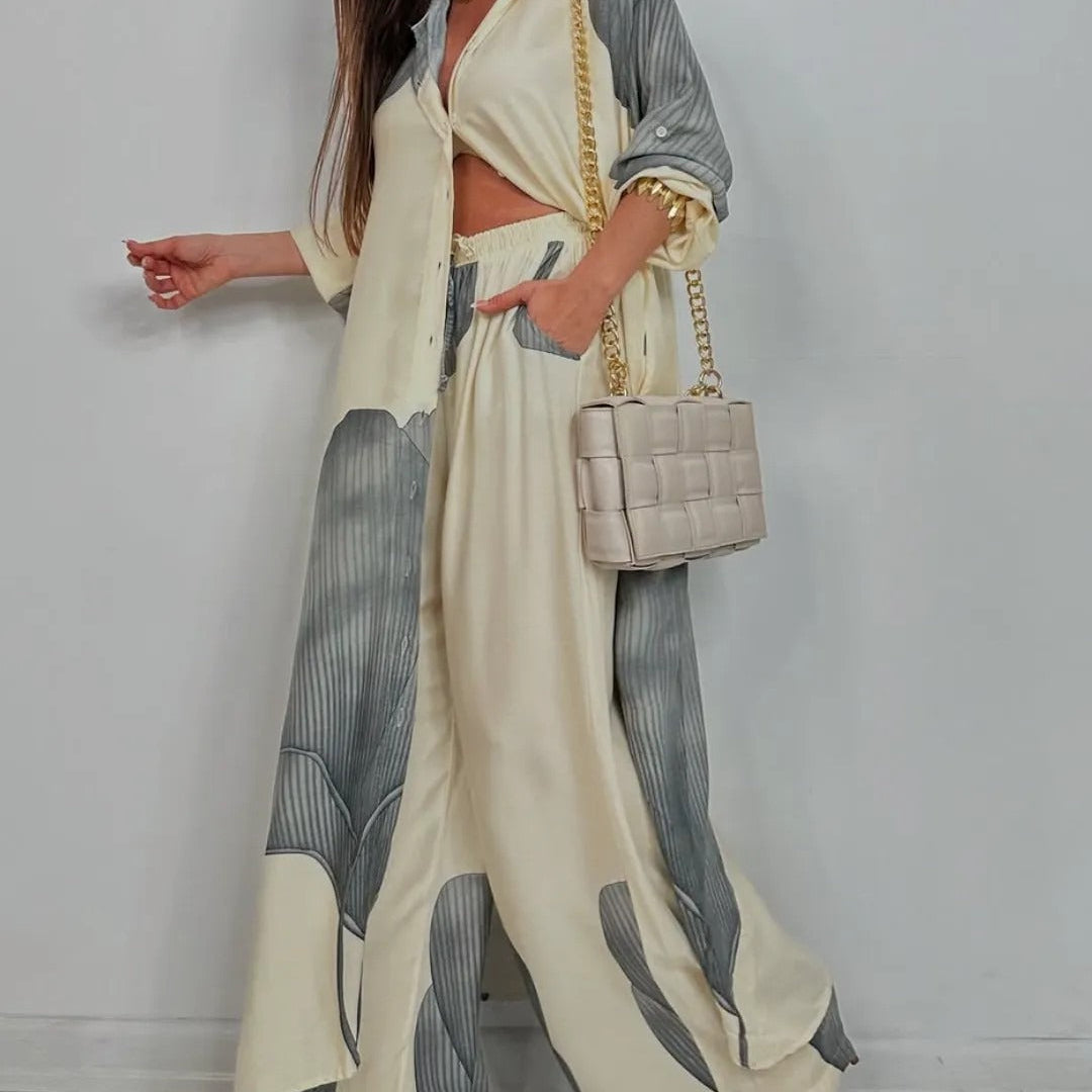 Conjunto de dos piezas para mujer: túnica larga abotonada y pantalón ancho y fluido.
