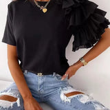 Camiseta de mujer – Algodón suave – Corte holgado – Mangas cortas – Hombros asimétricos con volantes