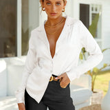 Blusa de mujer – Corte holgado – Tejido fluido con efecto sedoso – Mangas largas – Cuello clásico