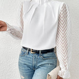 Top de manga larga para mujer – Corte estructurado – Cuello alto – Mangas transparentes con estampado de chevrones