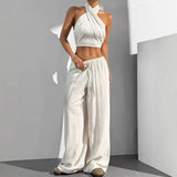Conjunto de mujer: Top corto con espalda cruzada, pantalón ancho con cintura elástica, algodón transpirable.
