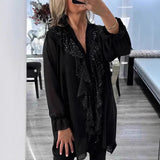 Blusa de mujer – Corte holgado – Tejido transparente – Mangas largas – Volantes brillantes