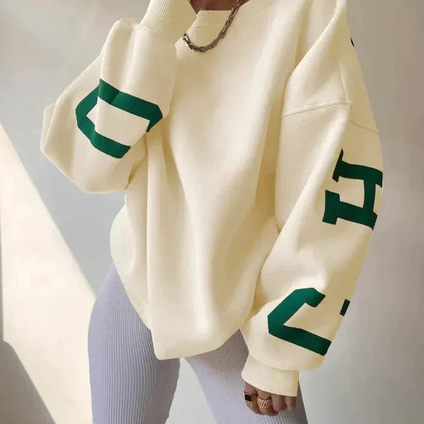 Sudadera de mujer – Corte oversize – Algodón suave – Hombros caídos – Estampado en la manga