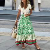 Falda larga de mujer – Talle alto – Estampado geométrico – Corte fluido con volantes
