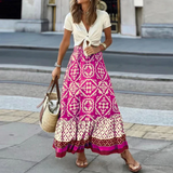 Falda larga de mujer – Talle alto – Estampado geométrico – Corte fluido con volantes