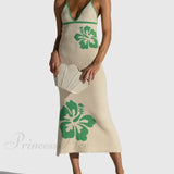 Vestido midi sexy con tirantes de malla, espalda abierta y escote en pico.