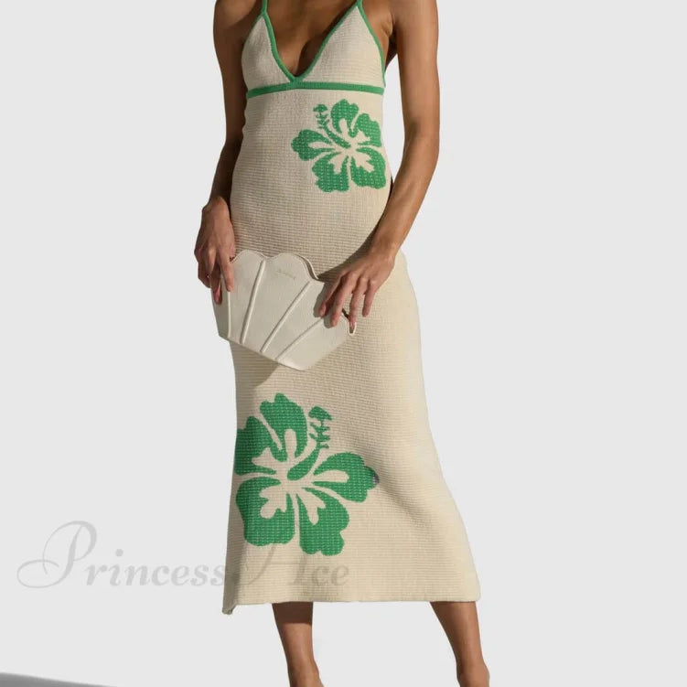 Vestido midi sexy con tirantes de malla, espalda abierta y escote en pico.