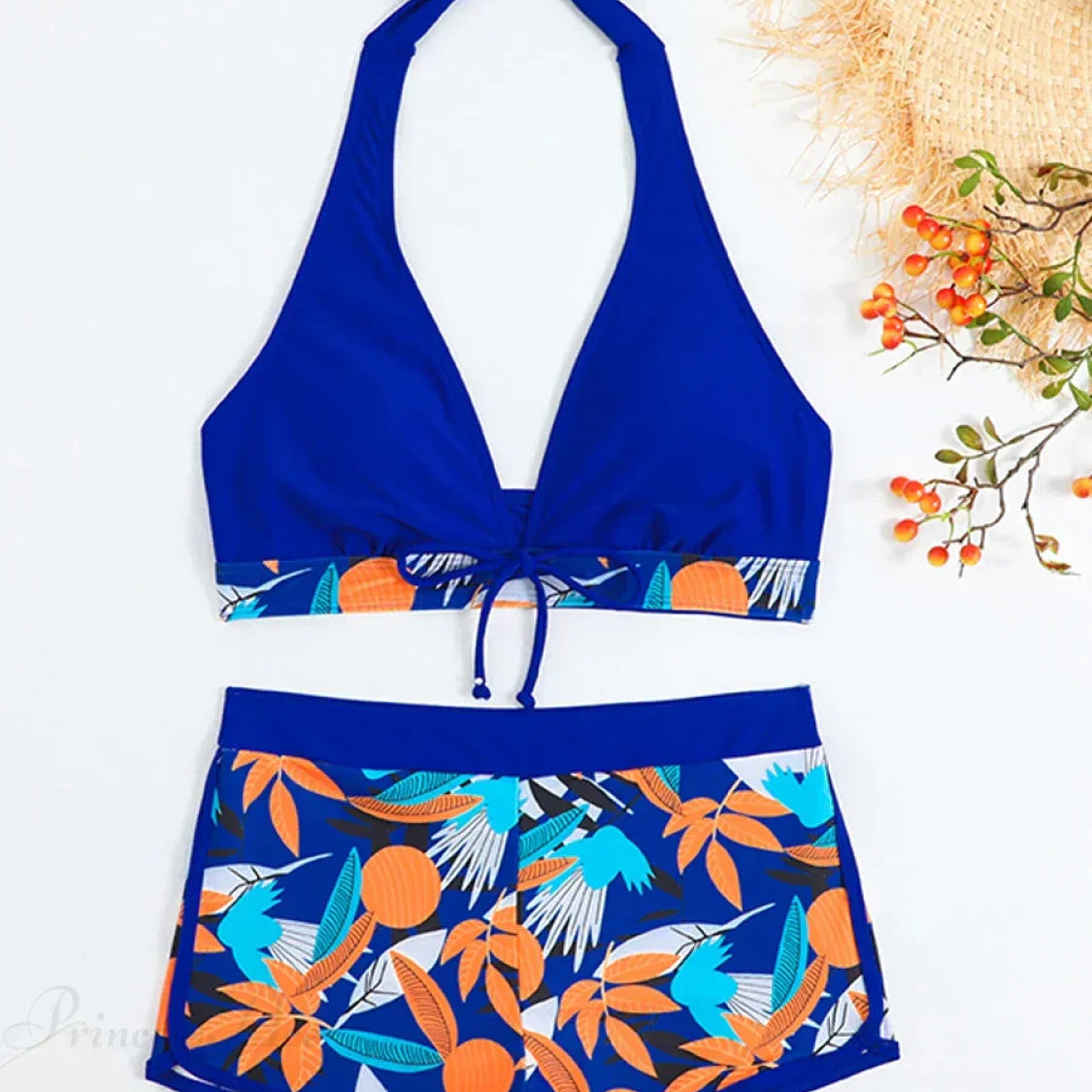 Conjunto de dos piezas con espalda abierta y estampado de hojas anudadas