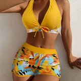 Conjunto de dos piezas con espalda abierta y estampado de hojas anudadas