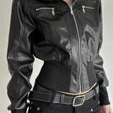 Chaqueta utilitaria oscura con bolsillos de cuero y patchwork