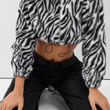 Chaqueta gruesa y esponjosa con forro polar y estampado de leopardo.
