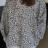 Sudadera con cuello en V, manga larga y estampado de leopardo con media cremallera