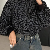 Sudadera con cuello en V, manga larga y estampado de leopardo con media cremallera