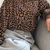 Sudadera con cuello en V, manga larga y estampado de leopardo con media cremallera