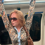 Blusa de manga larga con paneles con estampado de leopardo