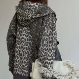 Sudadera con capucha y cremallera con estampado de leopardo y bloques de color