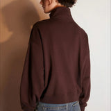 Sudadera oversize con media cremallera y cuello alto estampada con letras