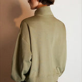 Sudadera oversize con media cremallera y cuello alto estampada con letras