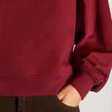 Sudadera oversize con media cremallera y cuello alto estampada con letras