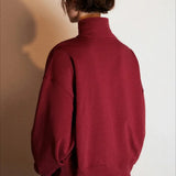 Sudadera oversize con media cremallera y cuello alto estampada con letras