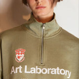 Sudadera oversize con media cremallera y cuello alto estampada con letras