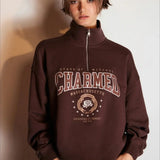 Sudadera oversize con media cremallera y cuello alto estampada con letras