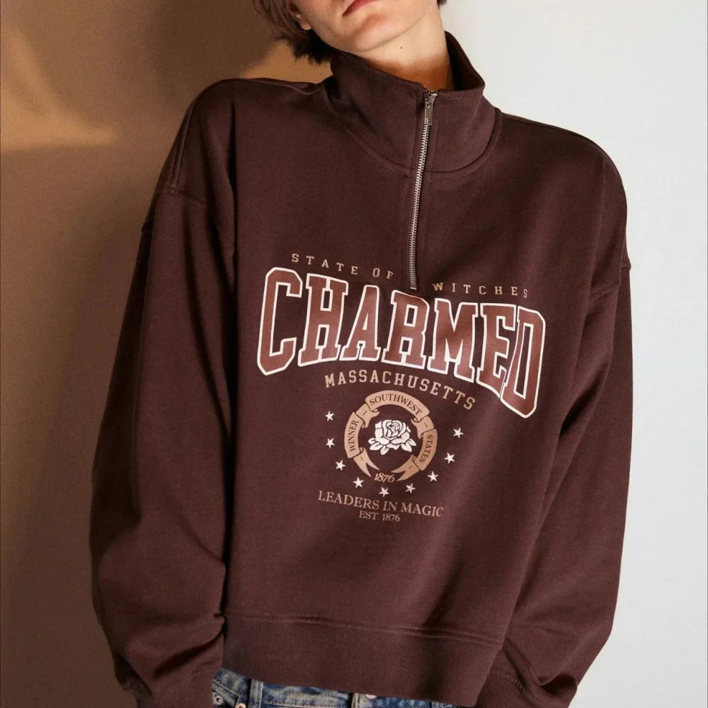 Sudadera oversize con media cremallera y cuello alto estampada con letras