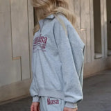 Sudadera casual de cuello convertible con estampado de letras y media cremallera