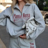Sudadera casual de cuello convertible con estampado de letras y media cremallera