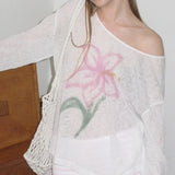 Blusa ligera, holgada y con protección solar.