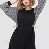Vestido de manga larga con cintura elástica.
