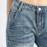 Vaqueros bootcut de tiro bajo y largo hasta el suelo