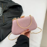Clutch de noche de lujo con lentejuelas, diseño refinado, ideal para una boda.