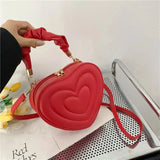 Bolso de hombro de piel sintética acolchada de lujo con forma de corazón