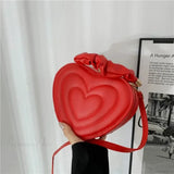 Bolso de hombro de piel sintética acolchada de lujo con forma de corazón