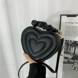 Bolso de hombro de piel sintética acolchada de lujo con forma de corazón