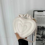 Bolso de hombro de piel sintética acolchada de lujo con forma de corazón