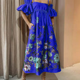 Vestido midi de corte A con mangas fruncidas y elegantes bolsillos, estampado caléndula, con bolsillos.