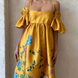 Vestido midi de corte A con mangas fruncidas y elegantes bolsillos, estampado caléndula, con bolsillos.