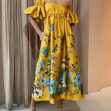 Vestido midi de corte A con mangas fruncidas y elegantes bolsillos, estampado caléndula, con bolsillos.