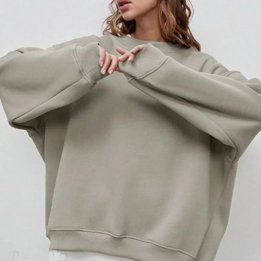 Sudadera minimalista de cuello redondo de gran tamaño
