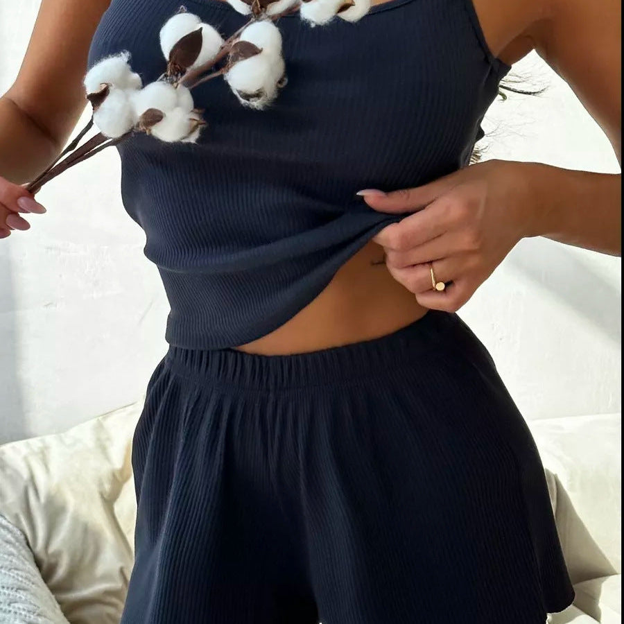 Conjunto de ropa de estar por casa para mujer: camiseta sin mangas con cuello en U y pantalones cortos cómodos con cintura elástica.