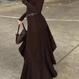 Vestido de punto con hombros descubiertos y bajo con volantes