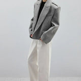 Blazer de lana con solapas de muesca extragrandes y hombreras