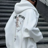 Sudadera con capucha extragrande con cremallera en un estilo urbano informal con estampado de ángel.