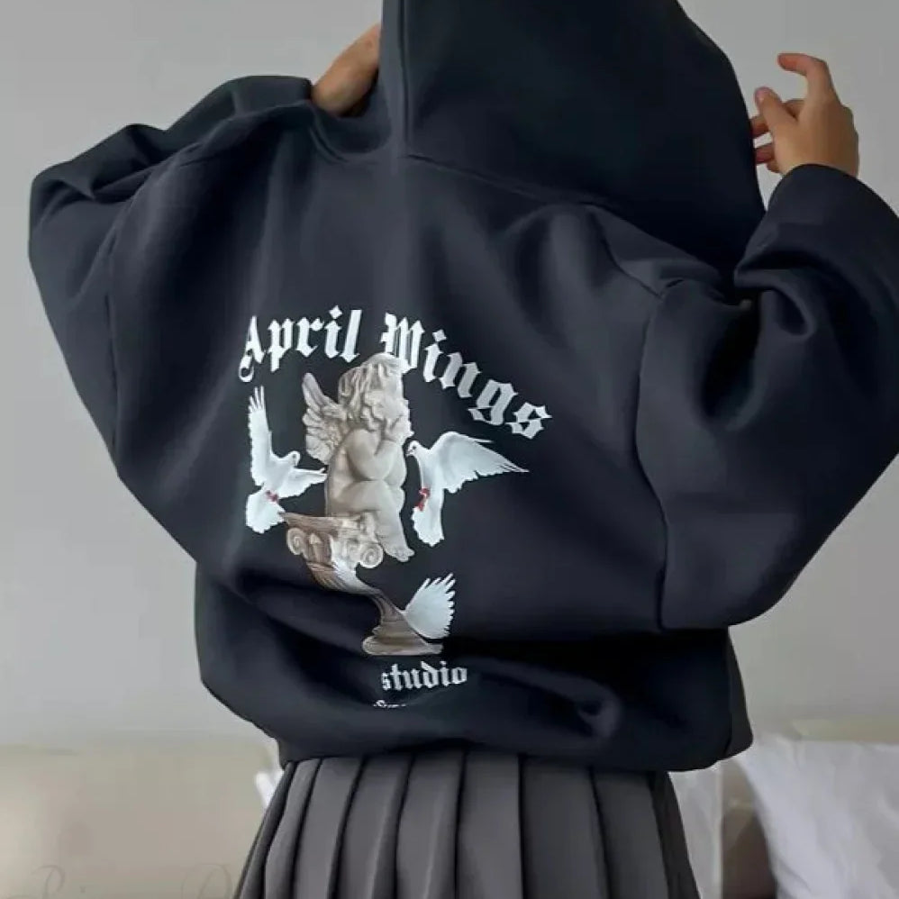 Sudadera con capucha extragrande con cremallera en un estilo urbano informal con estampado de ángel.