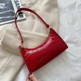 Bolso de hombro de charol de diseñador
