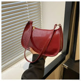 Bolso de hombro de charol de diseñador