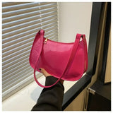 Bolso de hombro de charol de diseñador