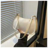 Bolso de hombro de charol de diseñador